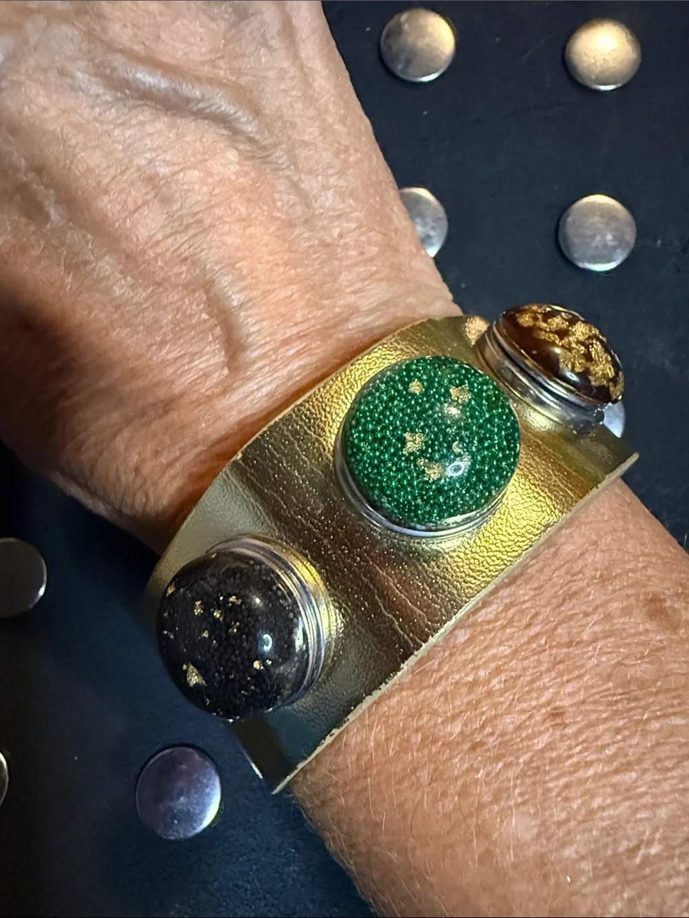 Snap Gold-Tone Cuff Bracelet with Green, Black, and Brown Accents